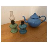 Two vintage metal kerosene lamps and teapot