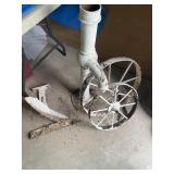 Outdoor decor, including antique wagon, wheels,