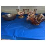 Five pieces of carnival glass, including candle