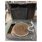 Antique gramophone and records. Missing its