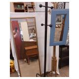 Two coat racks one wall mirror one floor mirror