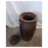 Crock Butter Churn has chip see picture lid is