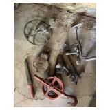 Antique breast drill, wood handled sharpener,