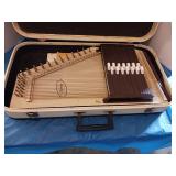 Autoharp with case made by Oscar Schmidt