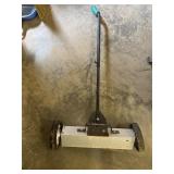 Magnetic floor sweeper. Has bent wheel