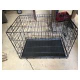Dog crate stands 21 inches tall, 30 inches wide,