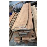 Rough sawn cherry lumber center stack. Longest