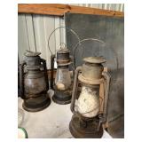 Three old lanterns, including C. T. Ham, EMBURY,