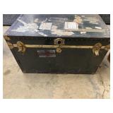 Vintage steamer trunk notice it is missing. It