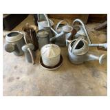 Old metal watering cans including Treurand,