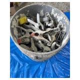 5 gallon bucket, full of clamps