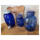 Two cobalt blue canisters and drink dispenser. I