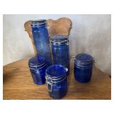 5 cobalt blue canisters