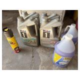 Four jugs engine oil, two jugs of deicer and one