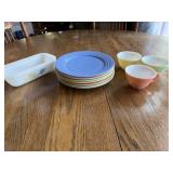 Vintage plates and cups and fire king loaf pan.