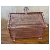 Pink depression glass log cabin candy jar