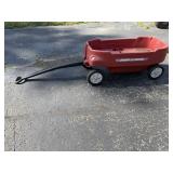 Radio flyer wagon and child