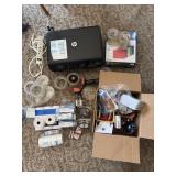 HP Envy 4500 printer, tape, and other office