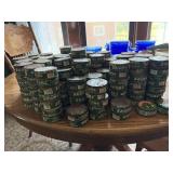 Vintage Skoal cans. Most are pretty rusty.