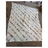 Two old quilts. Has a few stains and tears.