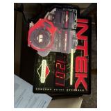 Lighted INTEK BRIGGS & STRATTON clock sign.