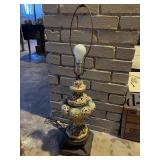 Vintage pierced porcelain lamp appears to be