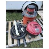 Two wet-dry vacs and hoses