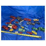 Several vintage toys, both plastic and metal
