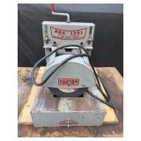 Rotary blade grinder with table
