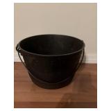 Cast iron 3 legged pot says 7JW on the bottom