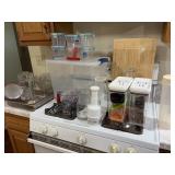 Miscellaneous plasticware, new cutting board and