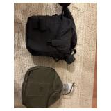 2 canteens. One with green cover is metal