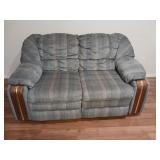 Love seat Reclines on both ends is in basement