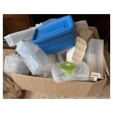 box full of plastic containers various shapes and