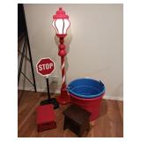 Festive floor lamp a stop sign two small wooden