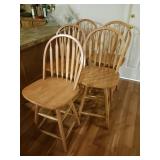 Five standard height bar stools. They swivel