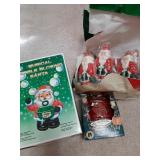 Bubble blowing Santa, Santa candles, and