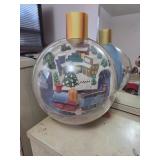 Giant ornament with spinning train