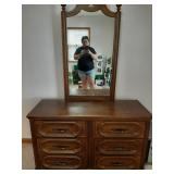 Dresser with matching queen (I think) headboard.
