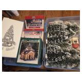 Christmas village accessories in plastic tote