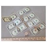 1968 Half dollar coin, US currency bills