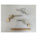 2 Metal Cap Guns & 1 Avon Shampoo Container