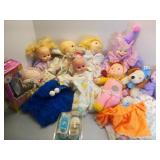 Assorted dolls-cabbage patch kids, cookie monster