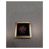 Small trinket box with chain inside