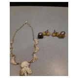Carved floral necklace & pear & honey dipper