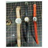 4 watches 1 Disney, 1 Rice Krispie, 1 ring, one