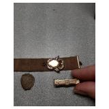 Collection of gold tone pins