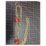 Vintage gold tone necklace with enamel eggs