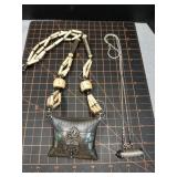 Vintage carved bone amulet necklace