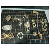 Vintage gold tone brooches